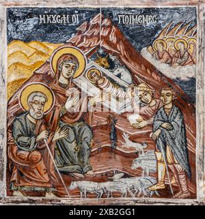 Mid 18th cen. nativity scene on a wall in the 13th cen. church of Agios Nikolaos in the village of Proastio, Outer Mani, Peloponnese, Greece. Stock Photo