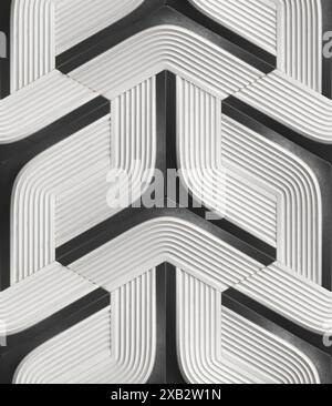 Captivating image showcasing a complex arrangement of intertwined gray and white geometric shapes with a distinct ridged texture Ideal for backgrounds Stock Photo