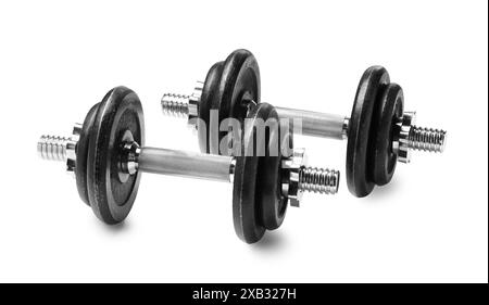 Metal dumbbells isolated on white. Sports equipment Stock Photo