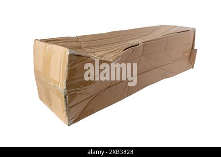 Damaged brown cardboard mailing box isolated on white. Mail container crumpled during shipment. Postal package with dent. Stock Photo