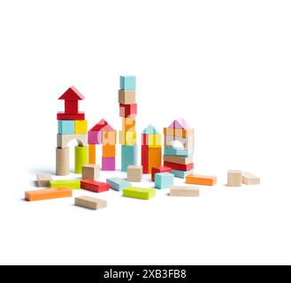 Houses made with toy blocks against white background Stock Photo