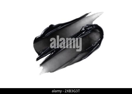 Charcoal toothpaste swatch isolated on white background. Black charcoal ...