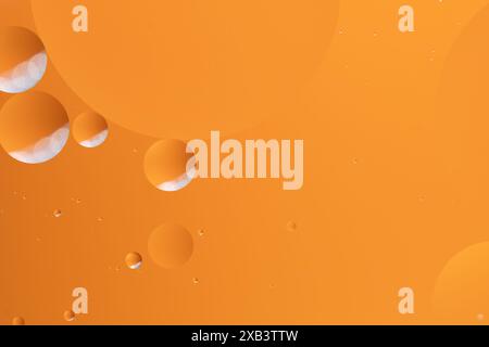Abstract art featuring vibrant orange hues with bubble like forms Stock Photo