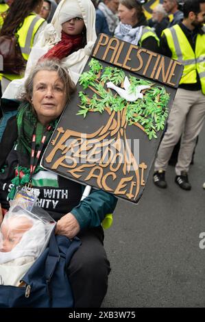 On June 8th 2024 thousands of people gather in Russell Square, London to march in support of Palestine and to protest against the continued Israeli bo Stock Photo
