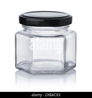 Front view of empty small glass jar with black lid isolated on white Stock Photo