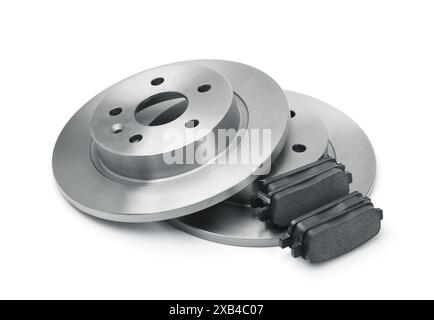 Set of unused car brake discs and pads isolated on white Stock Photo