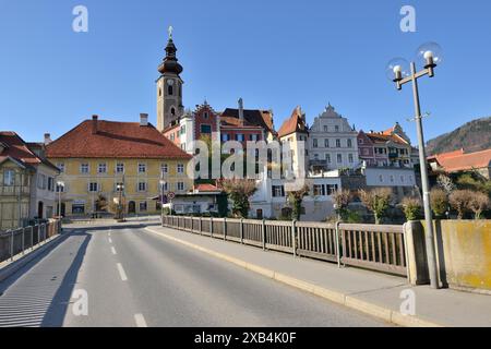 Small town view with church and historic buildings in clear skies and sunny weather, St Catherine's Church, Frohnleiten, Graz Stock Photo