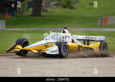 June 08, 2024: IndyCar #3 Scott McLaughlin driving his white and yellow Team Penske XPEL car loses control in turn #3 during qualifying before the XPEL Grand Prix at Road America in Elkhart Lake, WI - Mike Wulf/CSM (Credit Image: © Mike Wulf/Cal Sport Media) Stock Photo