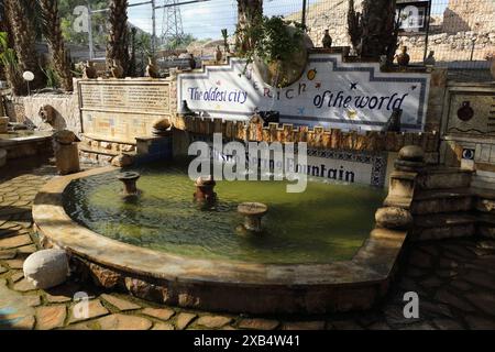 The fountain by the Biblical Elisha Spring or Ein Al Sultan in the Oasis of Jericho at the foot of Tel Jericho in the West Bank, Palestinian Authority Stock Photo