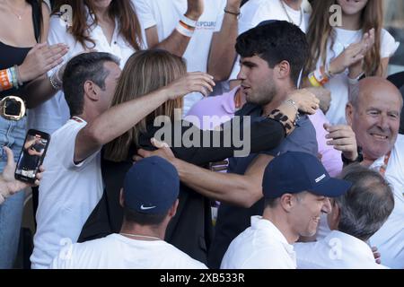 Carlos Alcaraz of Spain celebrates winning - here with his parents, Virginia Garfia Escandon and Carlos Alcaraz Gonzalez - the men's final against Alexander Zverev of Germany during day 15 of the 2024 French Open, Roland-Garros 2024, Grand Slam tennis tournament on June 9, 2024 at Roland-Garros stadium in Paris, France Stock Photo