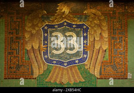 33rd street eagle mosaic in the NYC subway system in Manhattan Stock Photo