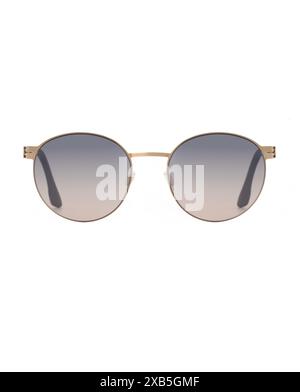 Front view of round Panto shaped sunglasses in metallic gold frames with purple-pink lenses on a white background close up Stock Photo