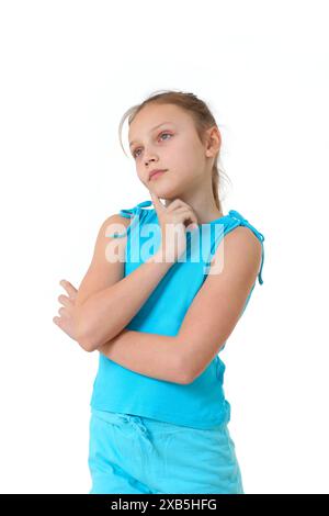 preteen girl deep in thoughts on white background Stock Photo