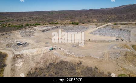 Machines working in cement quarry Stock Photo