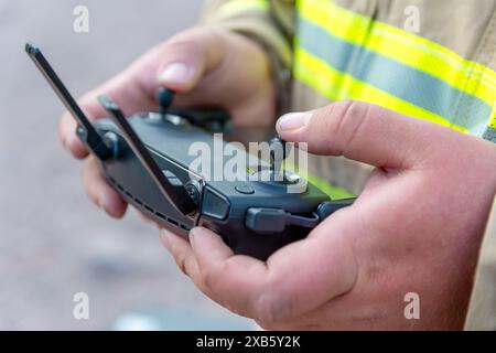 firefighter operating drone in search and rescue Stock Photo - Alamy