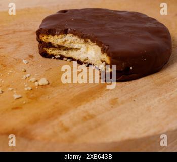 Crispy chocolate biscuits with vanilla cream inside, children's favorite fast food snack Stock Photo