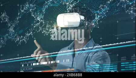 Middle-aged Caucasian man using virtual reality headset, interacting with digital interface Stock Photo