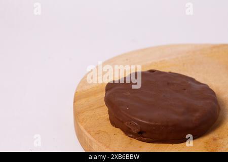 Crispy chocolate biscuits with vanilla cream inside, children's favorite fast food snack Stock Photo