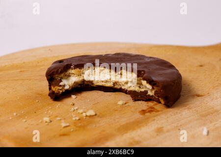Crispy chocolate biscuits with vanilla cream inside, children's favorite fast food snack Stock Photo