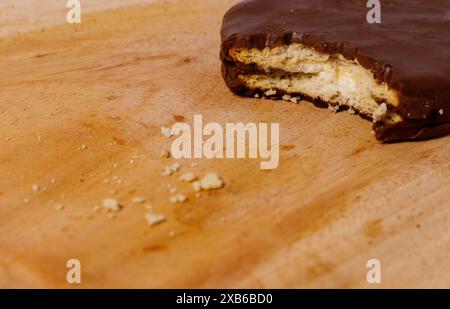 Crispy chocolate biscuits with vanilla cream inside, children's favorite fast food snack Stock Photo