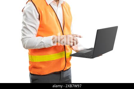 Asian engineer or technician hand holding laptop wear safety helmet and reflective vest Stock Photo