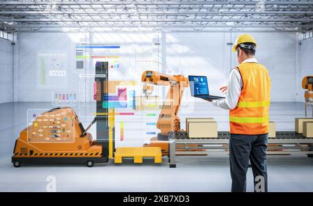 Technician or engineer work with robotic arms in factory Stock Photo