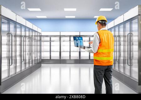 Technician or engineer check on fridge in store Stock Photo