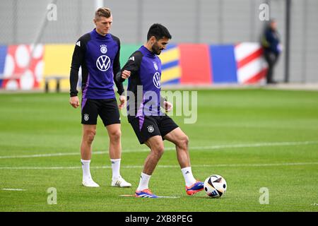 Herzogenaurach, Germany. 11th June, 2024. Soccer, preparation for UEFA Euro 2024, training Germany, Toni Kroos (l) and Ilkay Gündogan train. Credit: Federico Gambarini/dpa/Alamy Live News Stock Photo