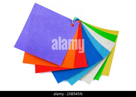 colored samples of fabric on the background. place for text. Stock Photo