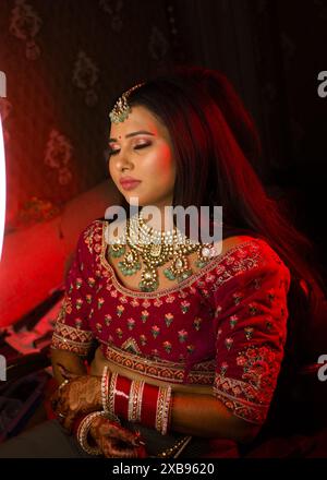 An Indian bride traditional dress on her wedding day Stock Photo