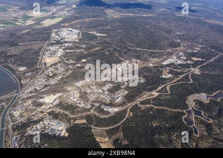 Dutch engineers and engineers from all over the world are working at ITER, International Fusion Energy Organization atomic energy research institute Cadarache in the Provence, France. The huge building is the Tokamak Assembly Hall with the fusion reactor. netherlands out - belgium out Stock Photo