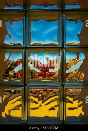 reflection of the old city in glass bricks giving an abstract image Stock Photo