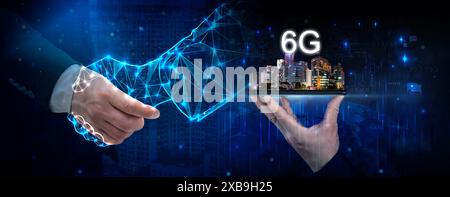Businessman holding smartphone with map point Global network connection 6G.concept Networking technologies and social interaction. 6G network digital Stock Photo