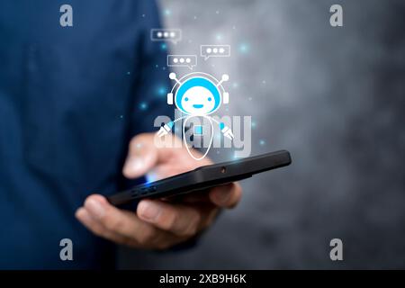 Digital chatbot, internet bot application, conversation assistant, AI Artificial Intelligence. Woman using mobile smart phone chatting with customer s Stock Photo