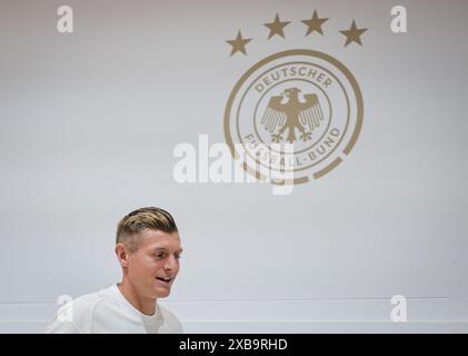 Herzogenaurach, Germany. 11th June, 2024. Soccer, preparation for UEFA Euro 2024, PK Germany, Toni Kroos arrives for a press conference. Credit: Christian Charisius/dpa/Alamy Live News Stock Photo