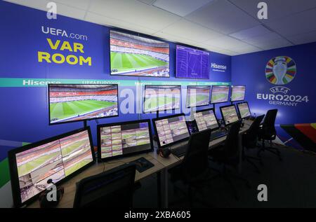 11 June 2024, Saxony, Leipzig: Soccer: European Championship, UEFA, view into the VAR Room at the International Broadcast Center. At the European Football Championship starting on June 14, controversial decisions will be analyzed by the video referee in the Leipzig exhibition hall. Around 40 cameras will be available to the three video referees for each match. Photo: Jan Woitas/dpa Stock Photo