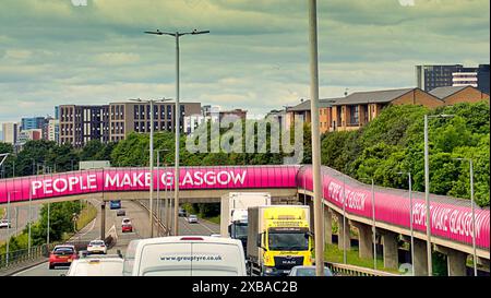 Glasgow, Scotland, UK. 11th June, 2024: UK Weather: Clydeside expressway with the pedestrian tunnel leading to the sec and   the ovo hydro Traffic and roadworks turning the city ino a dystopian nightmare. Sunny in  the city saw the city saw locals and tourists in the town centre. Credit Gerard Ferry/Alamy Live News Stock Photo