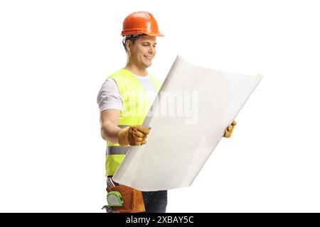 Construction worker holding a blueprint isolated on white background Stock Photo