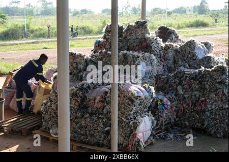 GHANA, Ashanti region, Kumasi, Gyankobaa W2E Waste To Energy Biogas plant with recycling and compost plant, plastic recycling station, sorted plastics in bales Stock Photo