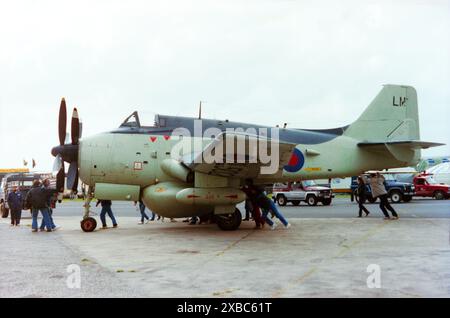 Fairey Gannet AEW.3 XL502, G-BMYP, being prepared to display at the 1987 Biggin Hill International Air Fair. The Fairey Gannet was a carrier-borne aircraft that was designed for the Royal Navy, being the first fixed-wing aircraft to combine both the search and strike portions of anti-submarine warfare (ASW) operations to be operated by the Fleet Air Arm. XL502 first flew in 1961 and served until 1978. It's service life included being operated from HMS Ark Royal. From 1986 the aircraft was flown in civilian ownership at airshows until 1990s. Became museum exhibit Stock Photo