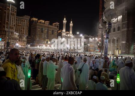 Mecca, Saudi Arabia - May 28, 2024: Muslim Pilgrims in The Haram Great Mosque of Mecca, Saudi Arabia, in the Hajj season. Stock Photo