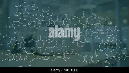 Image of chemical formulas over vr headset Stock Photo