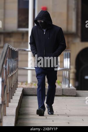 Adam Carruthers, 31, from Wigton, leaves Newcastle Crown Court, where he denied causing criminal damage following the felling of the Sycamore Gap tree, valued at £622,000 and £1,114 damage to Hadrian's Wall, which is a World Heritage Site. Picture date: Wednesday June 12, 2024. Stock Photo