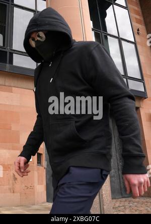 Adam Carruthers, 31, from Wigton, leaves Newcastle Crown Court, where he denied causing criminal damage following the felling of the Sycamore Gap tree, valued at £622,000 and £1,114 damage to Hadrian's Wall, which is a World Heritage Site. Picture date: Wednesday June 12, 2024. Stock Photo