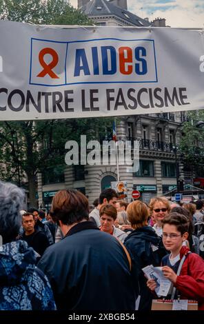 Paris, France, Group Young People, Aids Activists, AIDES Organization, Marching with Protest Sign,  Anti-Extreme Right ,Slogan , N.G.O « Against Fascism » Stock Photo