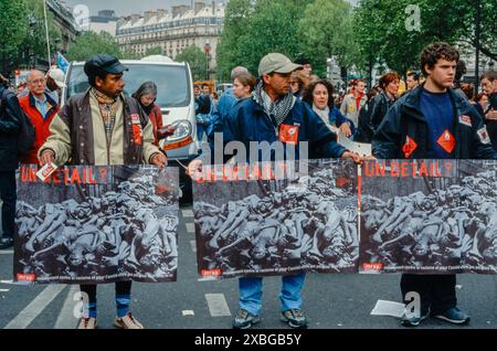 Paris, France, Group Young People, Marching with Protest Banner, Photos of Nazi COncentration Camp Victims, with Anti-Extreme Right Slogan 'a Detail' (of history), (MRAP, Mouvement Contre le Racisme et Pour l'Amitié entre les Peuples), N.G.O. Organisation Stock Photo