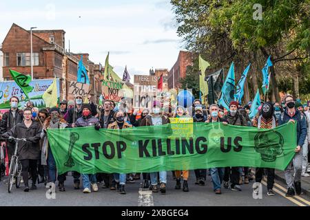 Glasgow, Strathclyde, Scotland, UK. 4th November 2021. Extinction Rebellion stage a protest outside the BAE Systems depot in Govan, Glasgow. BAE is an Stock Photo