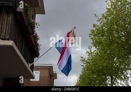 Schoolbag Hanging On A Flag At Amsterdam The Netherlands 12-6-2024 Stock Photo