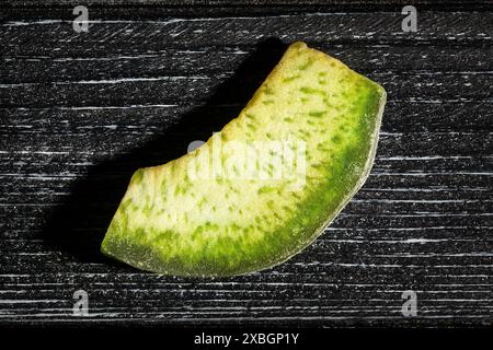 dry pomelo on black wood background top view Stock Photo