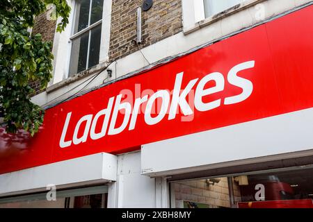 Ladbrokes betting shop in Junction Road, North London, UK Stock Photo